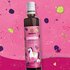 Illustration featuring the SONNENTOR unicorn syrup bottle on a berry-coloured background.